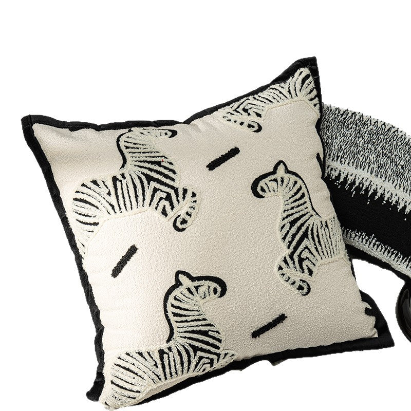 Dekokissen mit Tiermuster oder geometrischem Design