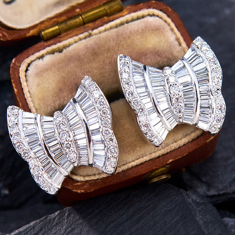 Elegante Ohrringe mit Schmetterling und Schleife – Bild 2 | LuxeStyle