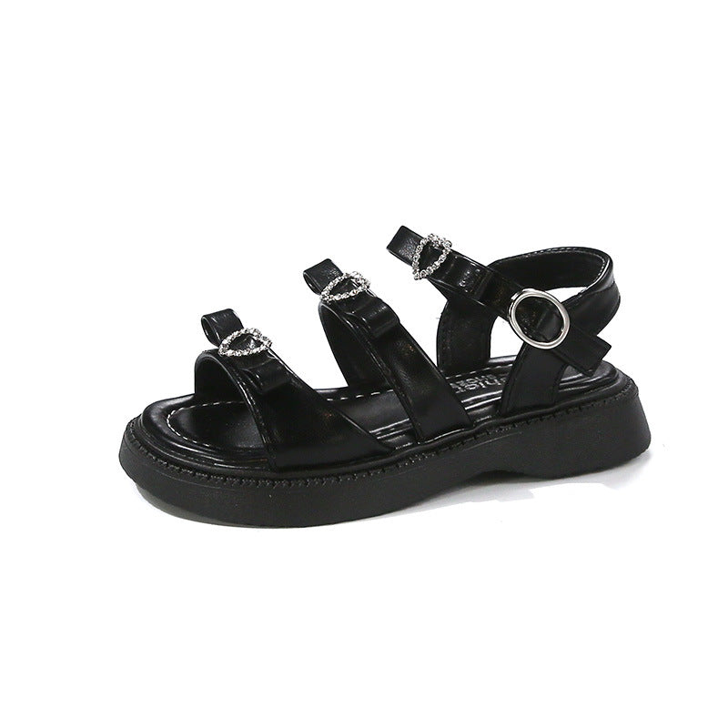 Herzförmige Sandalen mit Strass