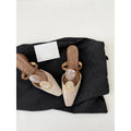 Mules mit Bernstein-Schnalle · Sommer