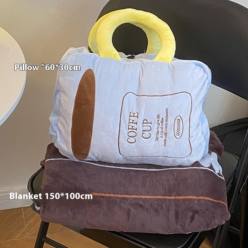 Plaids und Kissen in einem