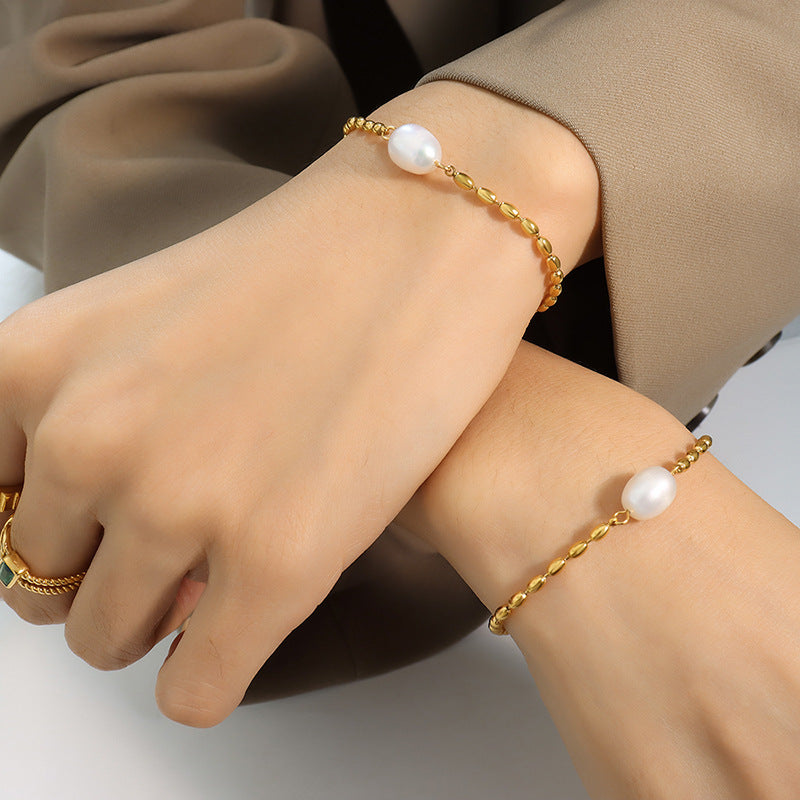 Minimalistisches Goldarmband mit Perle – Bild 4 | LuxeStyle