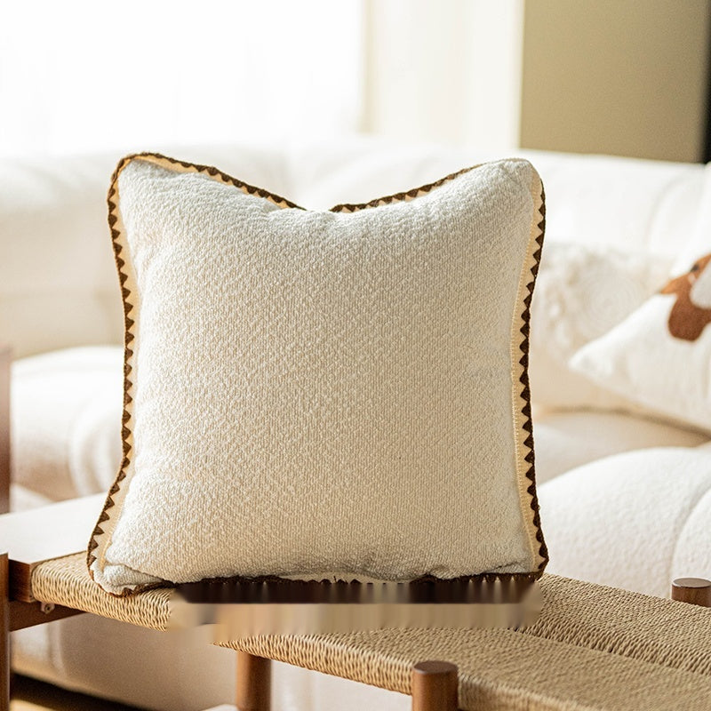 Niedliches Kissen im Creme-Stil
