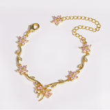 Modell: Schmetterlingsschleife Rosa Zirkon Gold