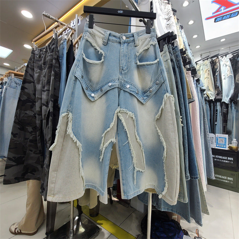 Weite Denim Jeans mit Rohschnitt