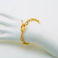 Minimalistisches Kreuzketten-Armband, vergoldet – Bild 1 | LuxeStyle