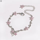 Modell: Schleife Rosa Weissgold