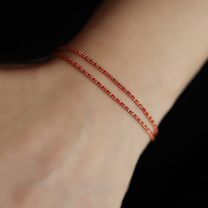 Geflochtenes Armband mit rotem Faden | LuxeStyle