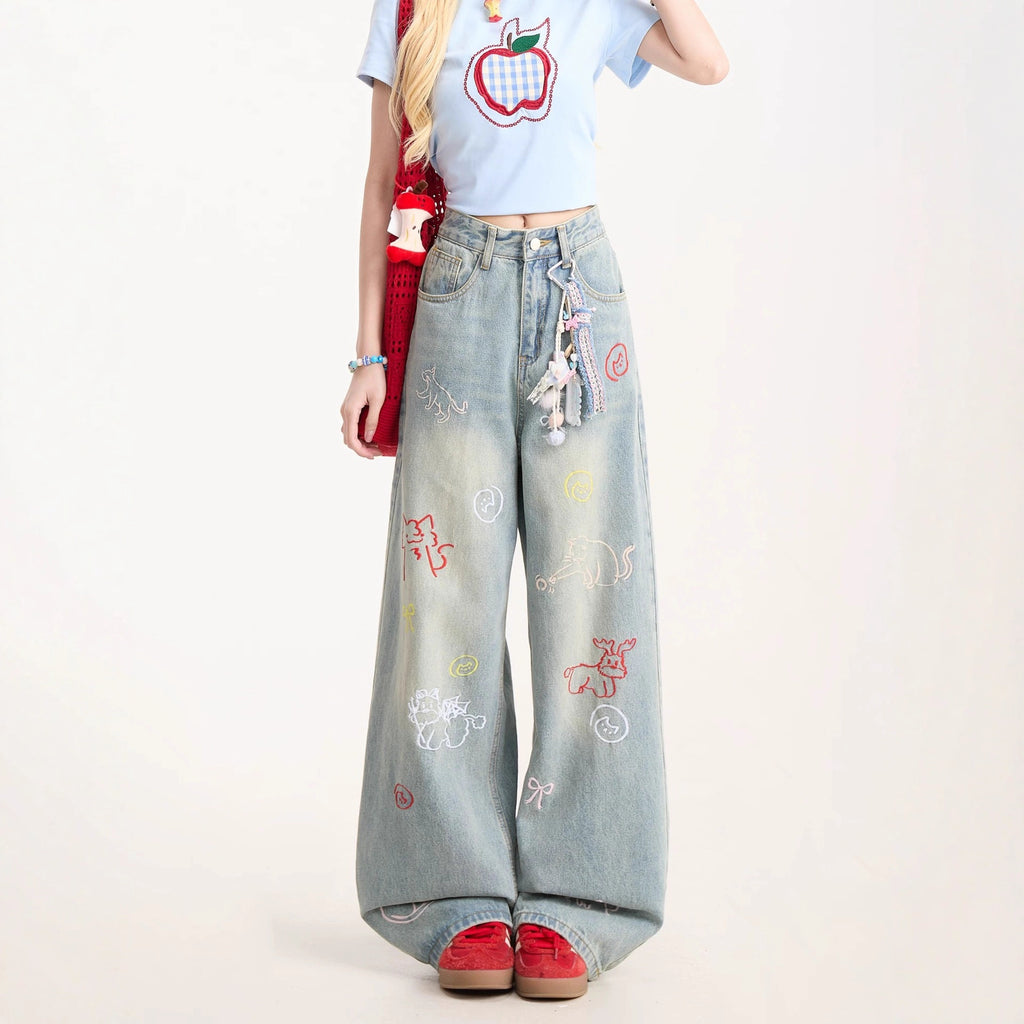 Blaue Jeans mit Cartoon-Stickerei