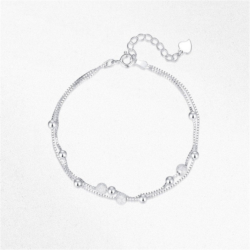 Doppelreihiges Armband mit Perlen – Bild 2 | LuxeStyle