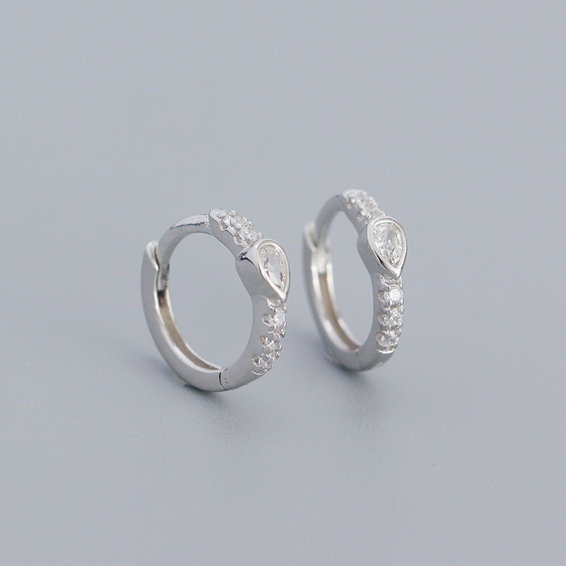 Diamantbesetzte Creolen