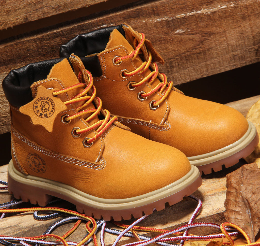 Gelbe Leder-Winterstiefel für Kinder