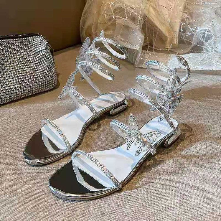 Glitzernde Sandalen mit Schlangenwicklung – Bild 4 | LuxeStyle