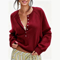 Halbgeöffnete Bluse mit Knöpfen