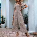 Geblümter Jumpsuit mit Puffärmeln – Bild 1 | LuxeStyle
