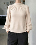 Strickpullover mit Rollkragen und Spitze