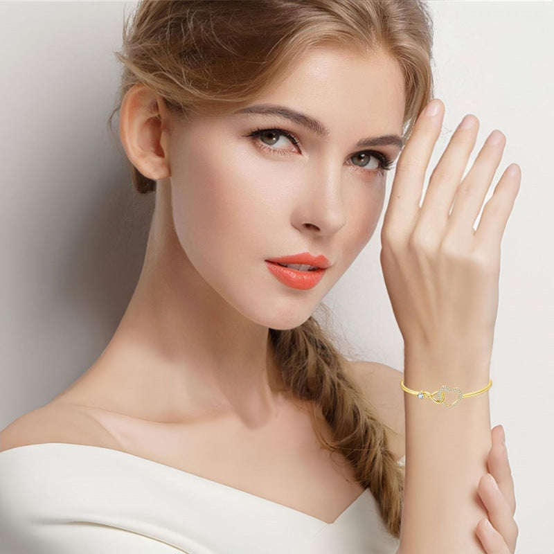 Herz-Armreif mit Zirkonia, Weissgold-Optik – Bild 6 | LuxeStyle