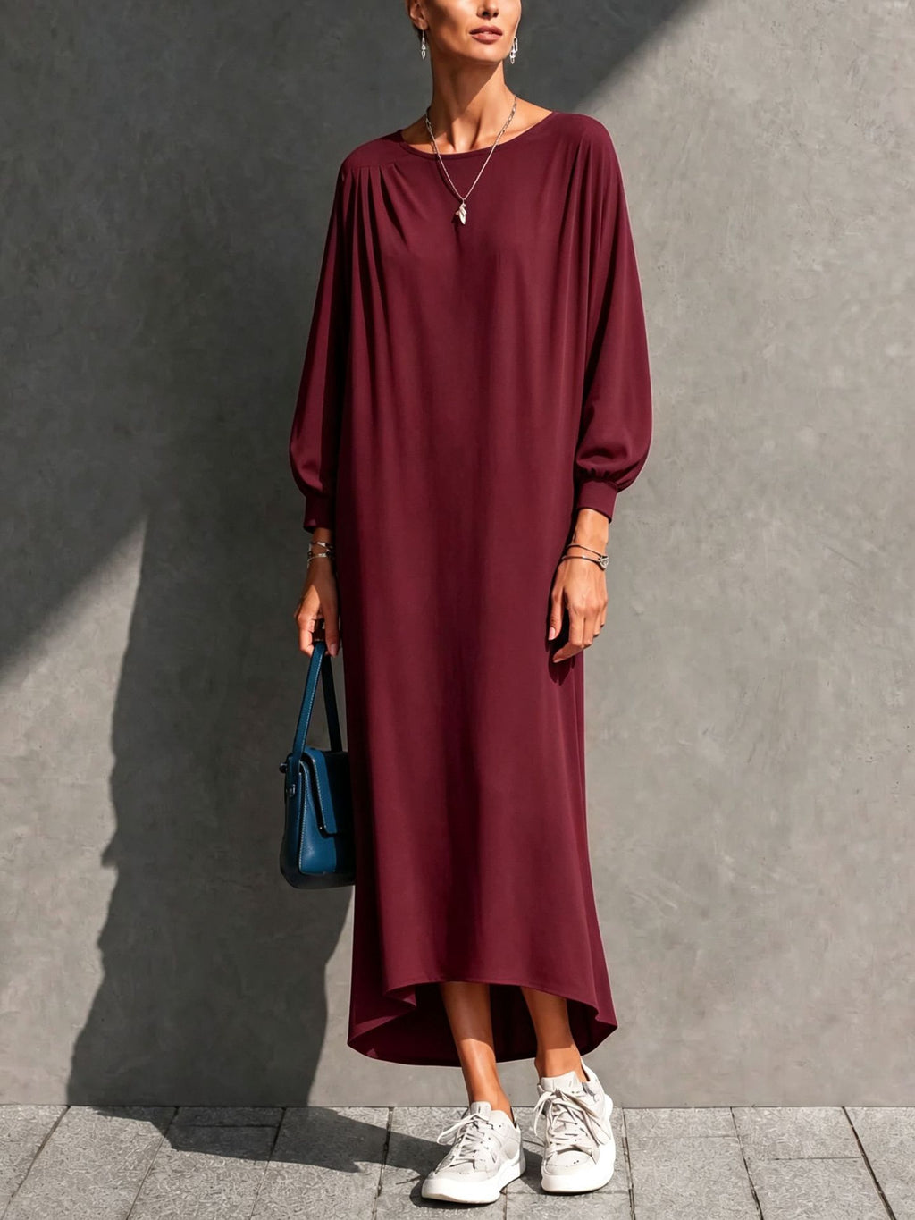 Plissiertes Batwing-Maxikleid mit asymmetrischem Saum