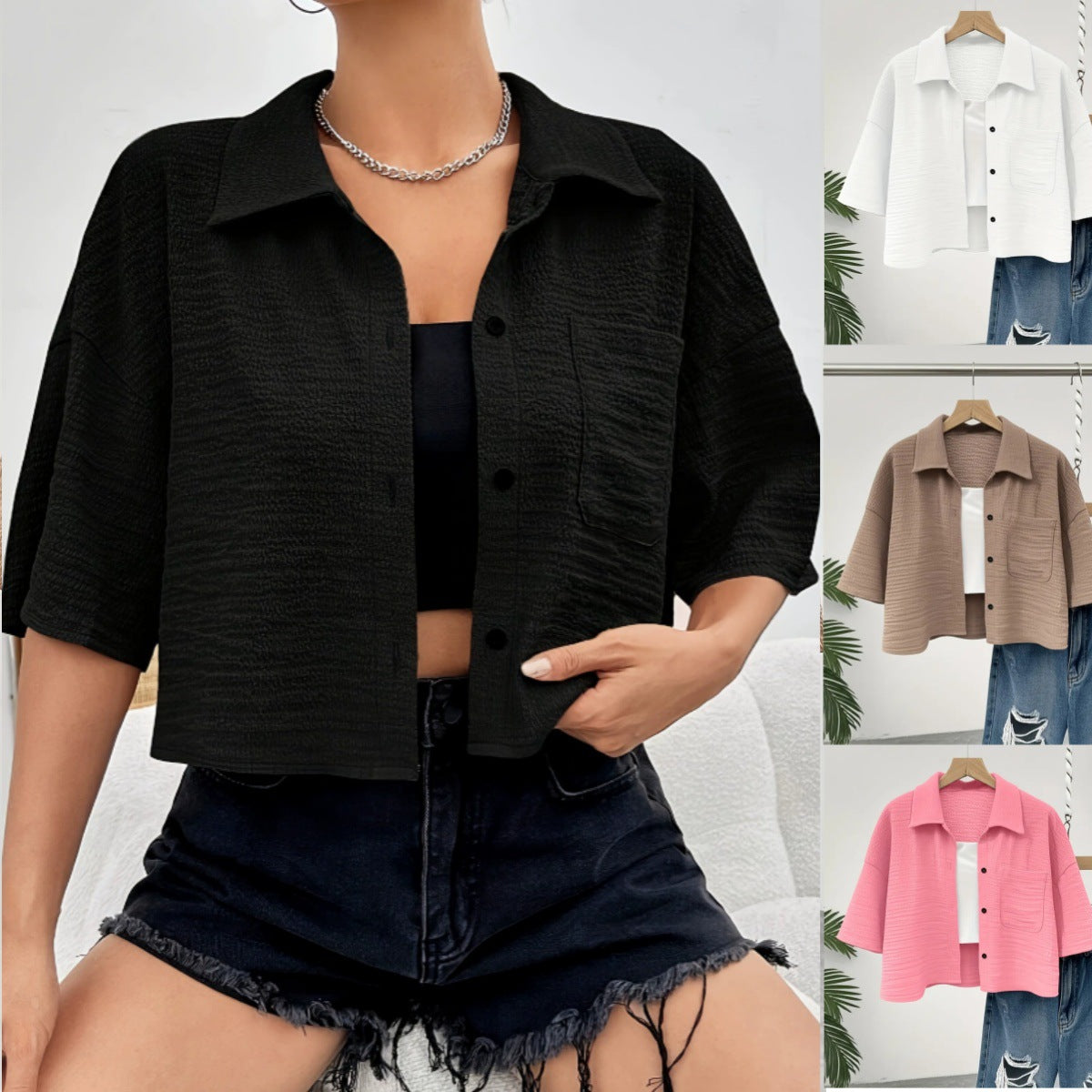 Kurze Bluse mit Knopf-Taschen