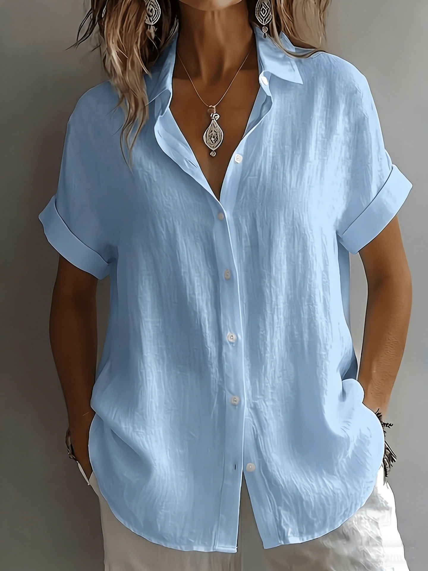 Atmungsaktive Bluse mit Plissee-Textur