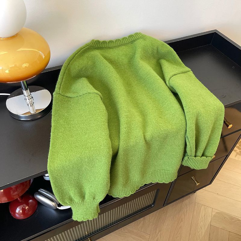 Grüner Strick-Cardigan mit Blumenmuster