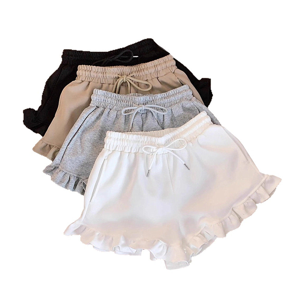 High Waist Shorts mit weitem Bein und Rüschen