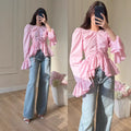 Elegante Damenbluse mit Rüschen und Knopfleiste