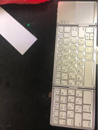 Ultra-dünne, faltbare Bluetooth-Tastatur mit Touchpad