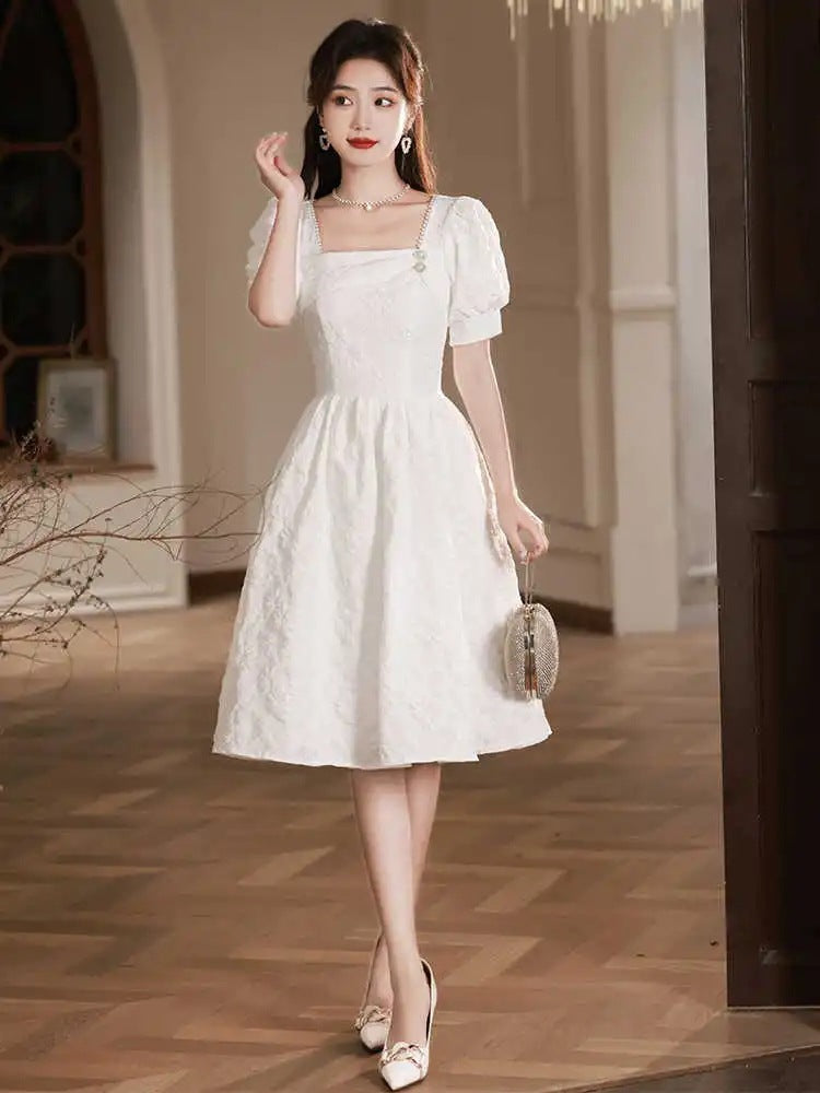 Kurzarm-Cocktailkleid mit Puffärmeln – Bild 6 | LuxeStyle