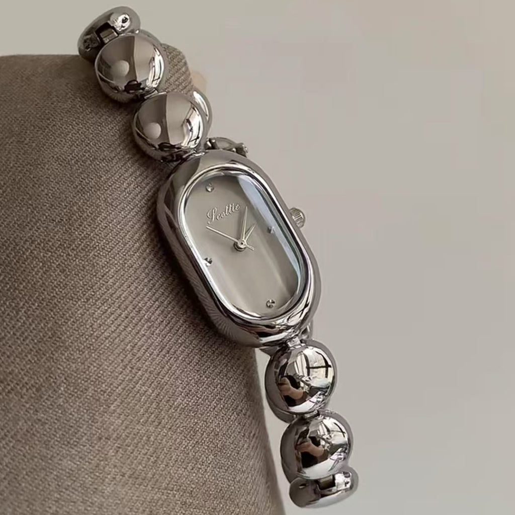 Oval-Uhr mit Quarzwerk und dekorativem Gehäuse – Bild 9 | LuxeStyle