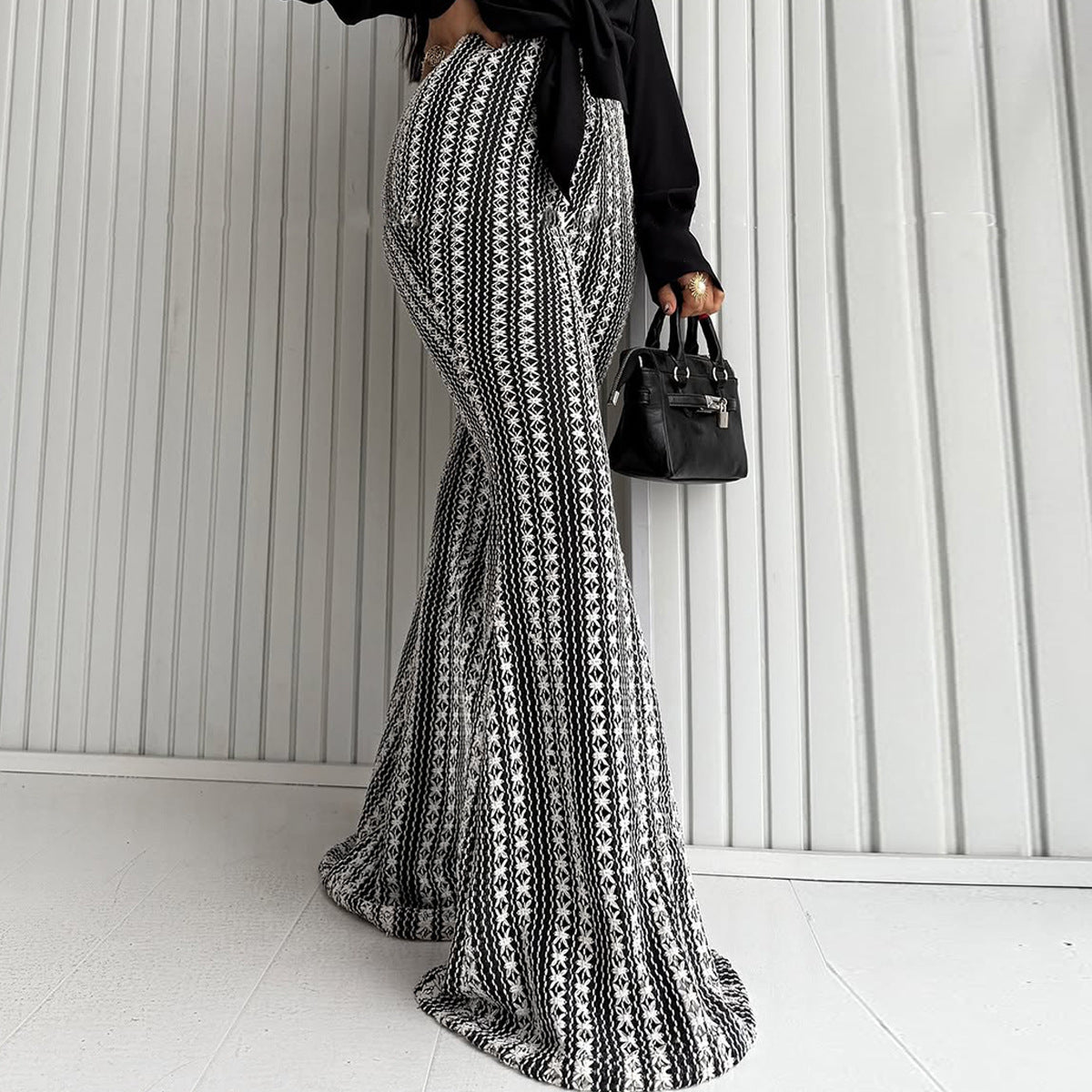 Gestreifte Mid-Rise Stretch Flare Leggings