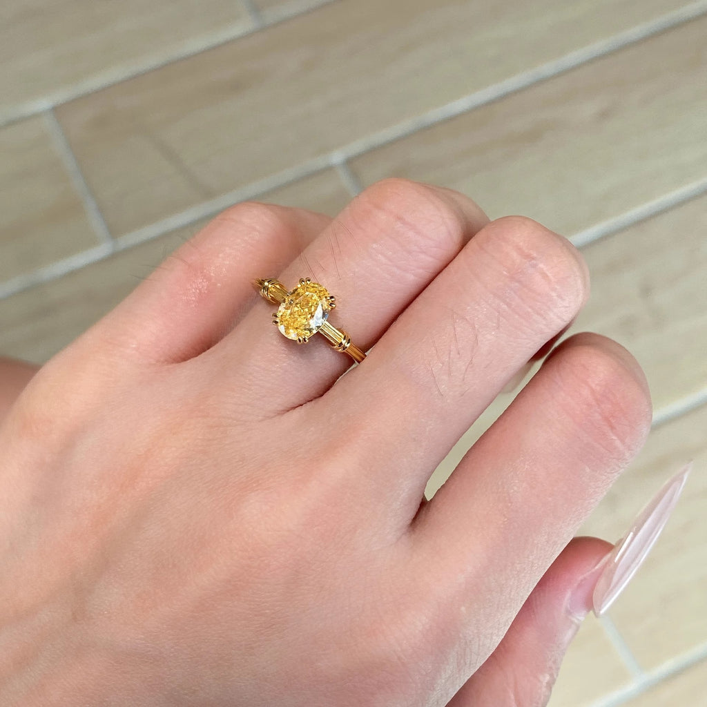 Damenring mit gelbem Diamant