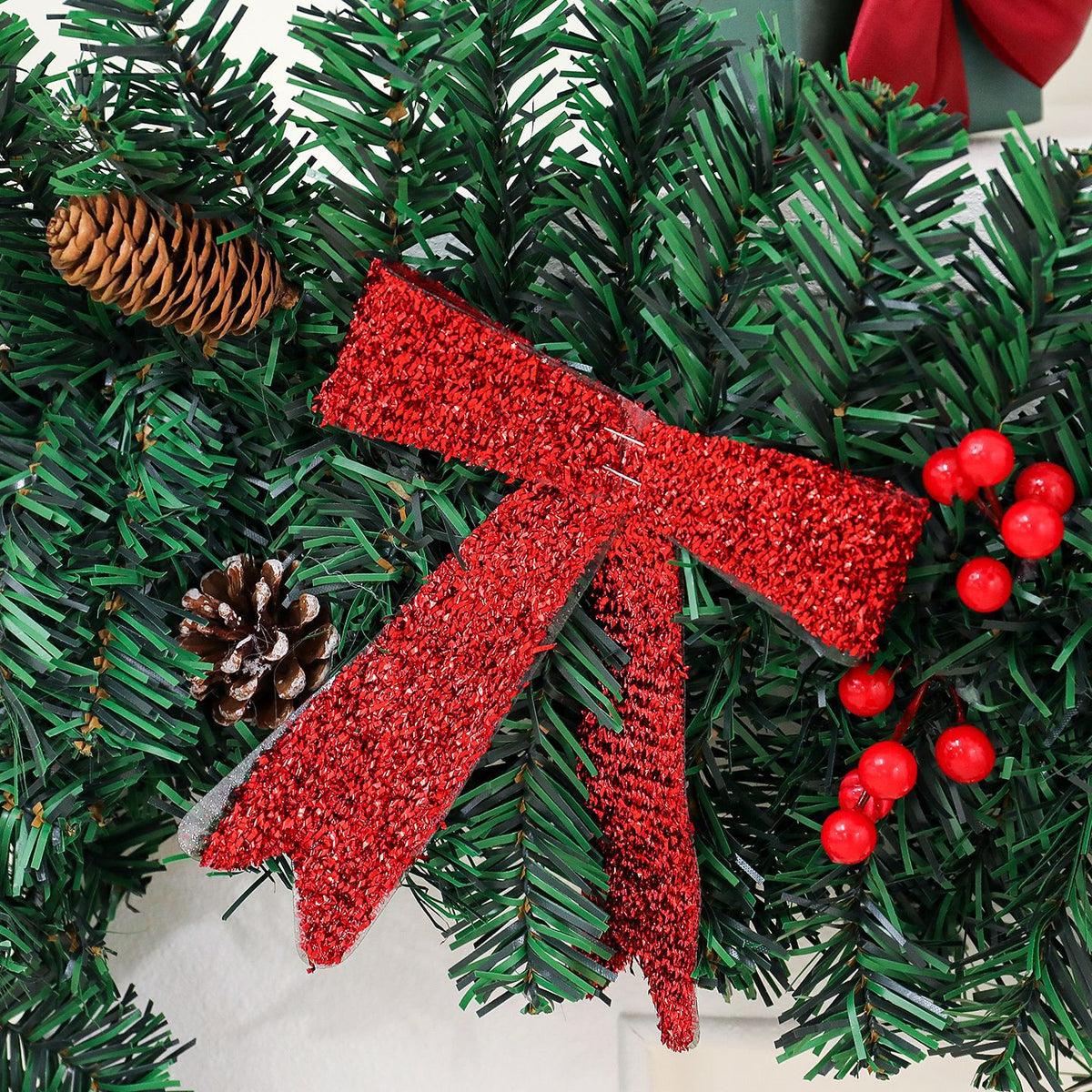 Weihnachts-Rattan-Girlande mit Zapfen und Schleife | LuxeStyle