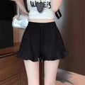 High Waist Shorts mit weitem Bein und Rüschen