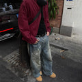 Loose Fit Jeans mit Distressed-Effekt