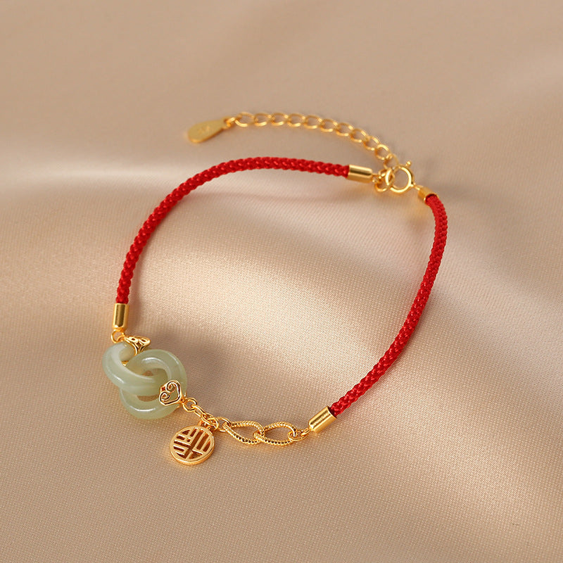 Retro Flechtarmband mit rotem Faden | LuxeStyle