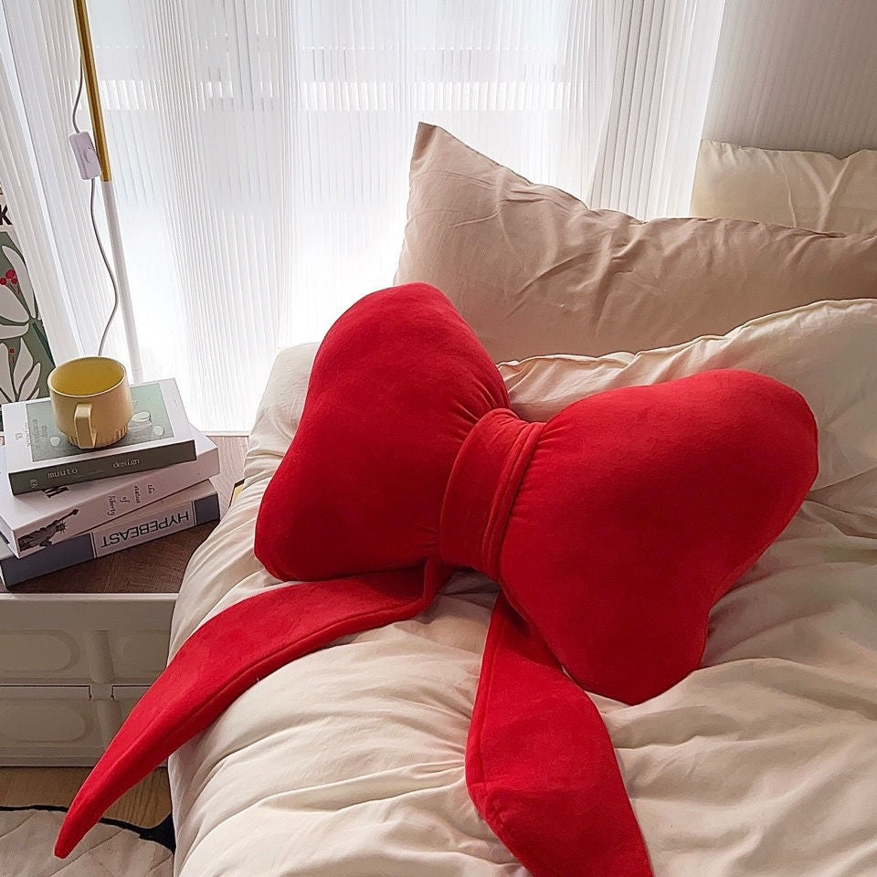 Kissen mit roter oder dunkelgrüner Schleife – Bild 3 | LuxeStyle