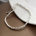 Asymmetrisches Kettenarmband mit Perlen – Bild 3 | LuxeStyle