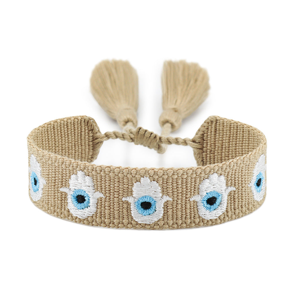 Glücksarmband mit Evil Eye Stickerei und Quaste – Bild 3 | LuxeStyle