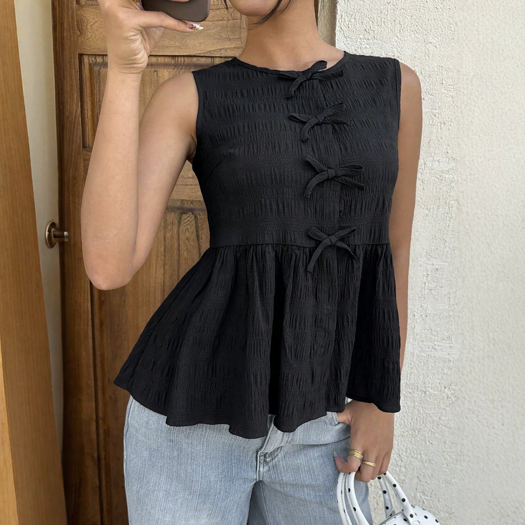 Elegantes ärmelloses Top mit Schleifendetail