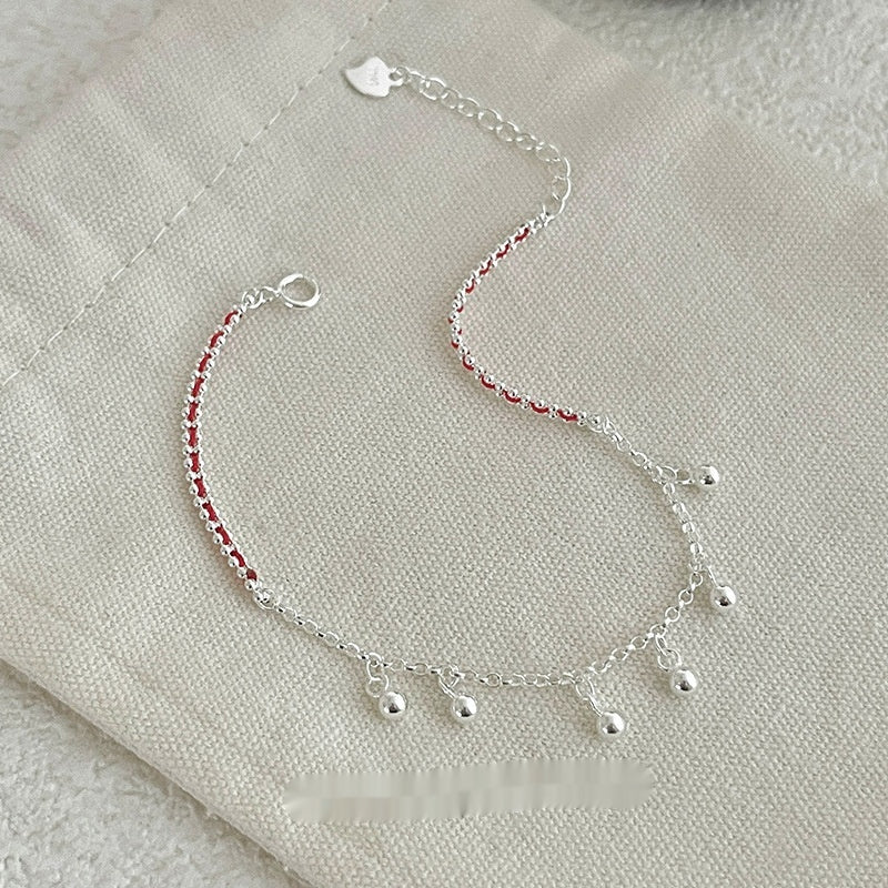 S925 Silber Armband mit roten Quasten – Bild 4 | LuxeStyle
