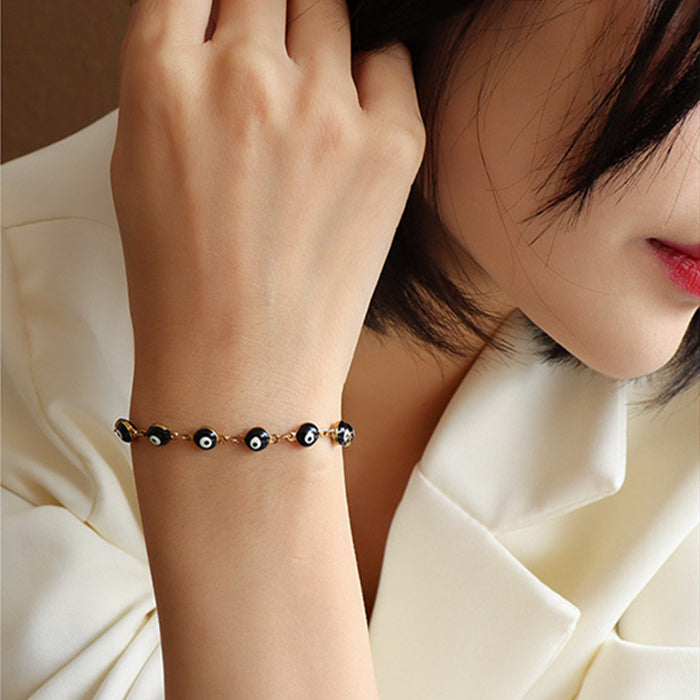 Schwarzes Öl-Tropfen-Armband aus Titanstahl für Damen – Bild 2 | LuxeStyle