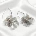 Ohrstecker mit hohlem Blumen-Design
