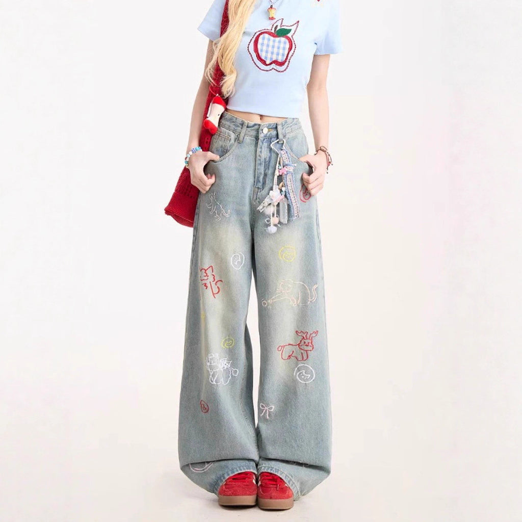 Blaue Jeans mit Cartoon-Stickerei