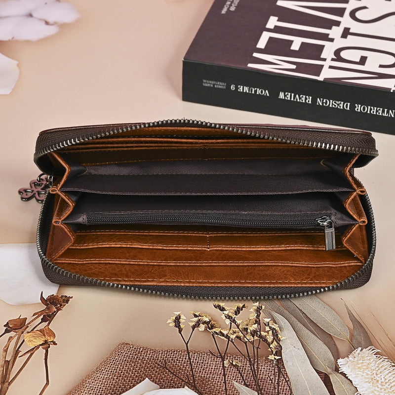 Leder-Geldbörse mit Reissverschluss und Blumenfutter – Bild 5 | LuxeStyle