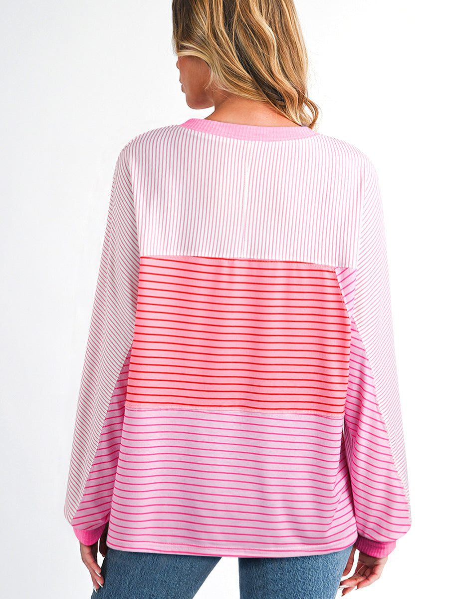 Rosa Pullover mit Streifen