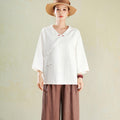 Vintage Langarmshirt mit diagonaler Knopfleiste