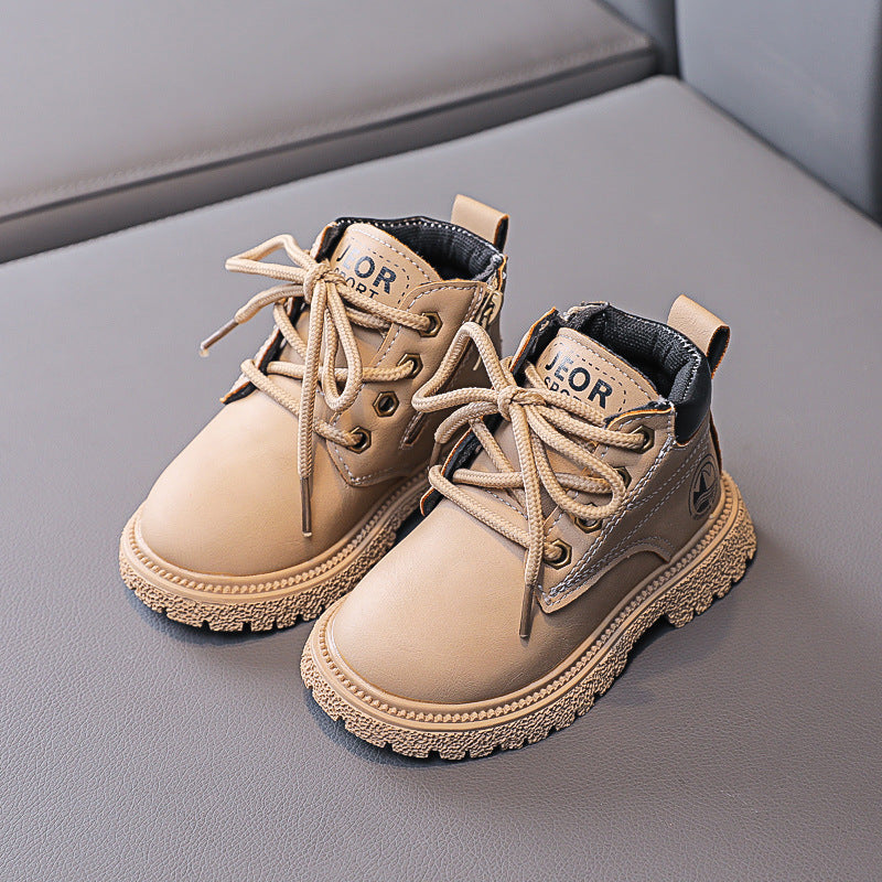 Gelbe Kinderstiefel