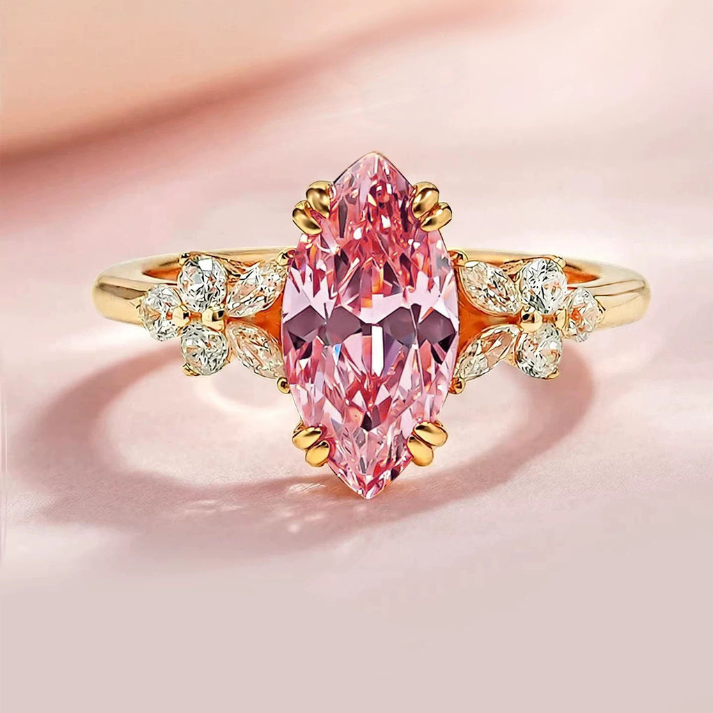 Edler Padparadscha-Ring mit Marquise-Schliff