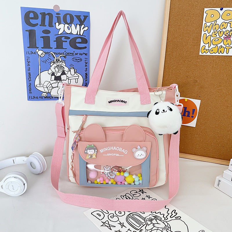 Nylon Rucksack mit Fuzzy-Ball Anhänger – Bild 8 | LuxeStyle